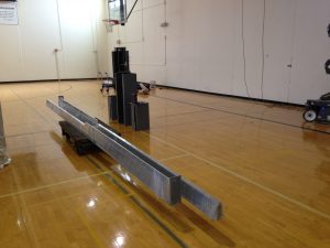 Wrestling mat hoist lifter